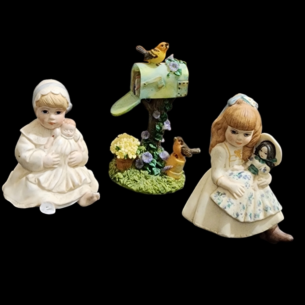 Jan Hagara two little vintage girls with their dollies and a mailbox